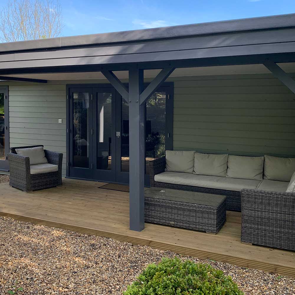 Timber-clad insulated garden office with glazed doors