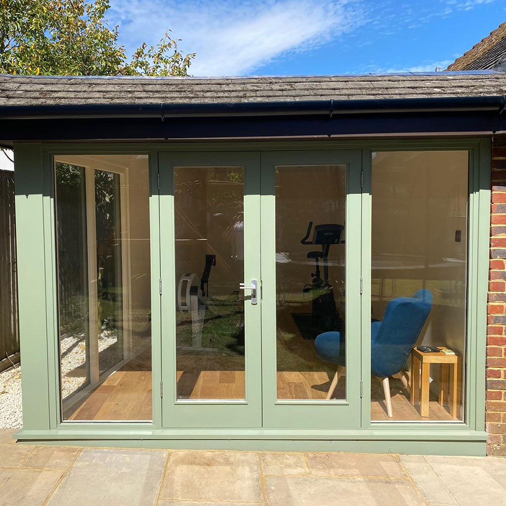 Brick corner extension with pitched tiled roof built by Rhys Child Construction